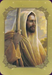 Bild einer Hand, die eine Jesus Karte aus einem verzierten Kartenstapel zieht